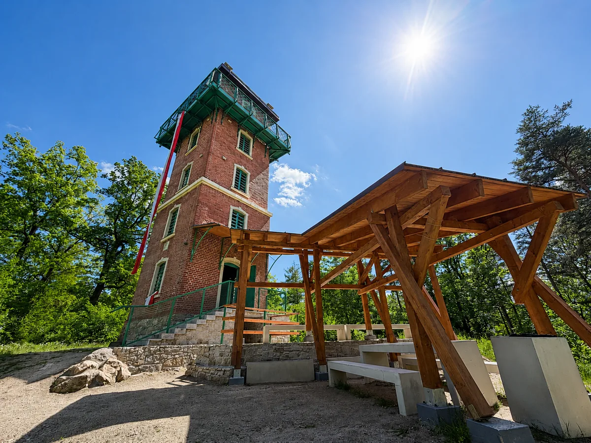 The brick Kaiser Friedrich lookout tower on Sołtysia Hill with a picnic shelter